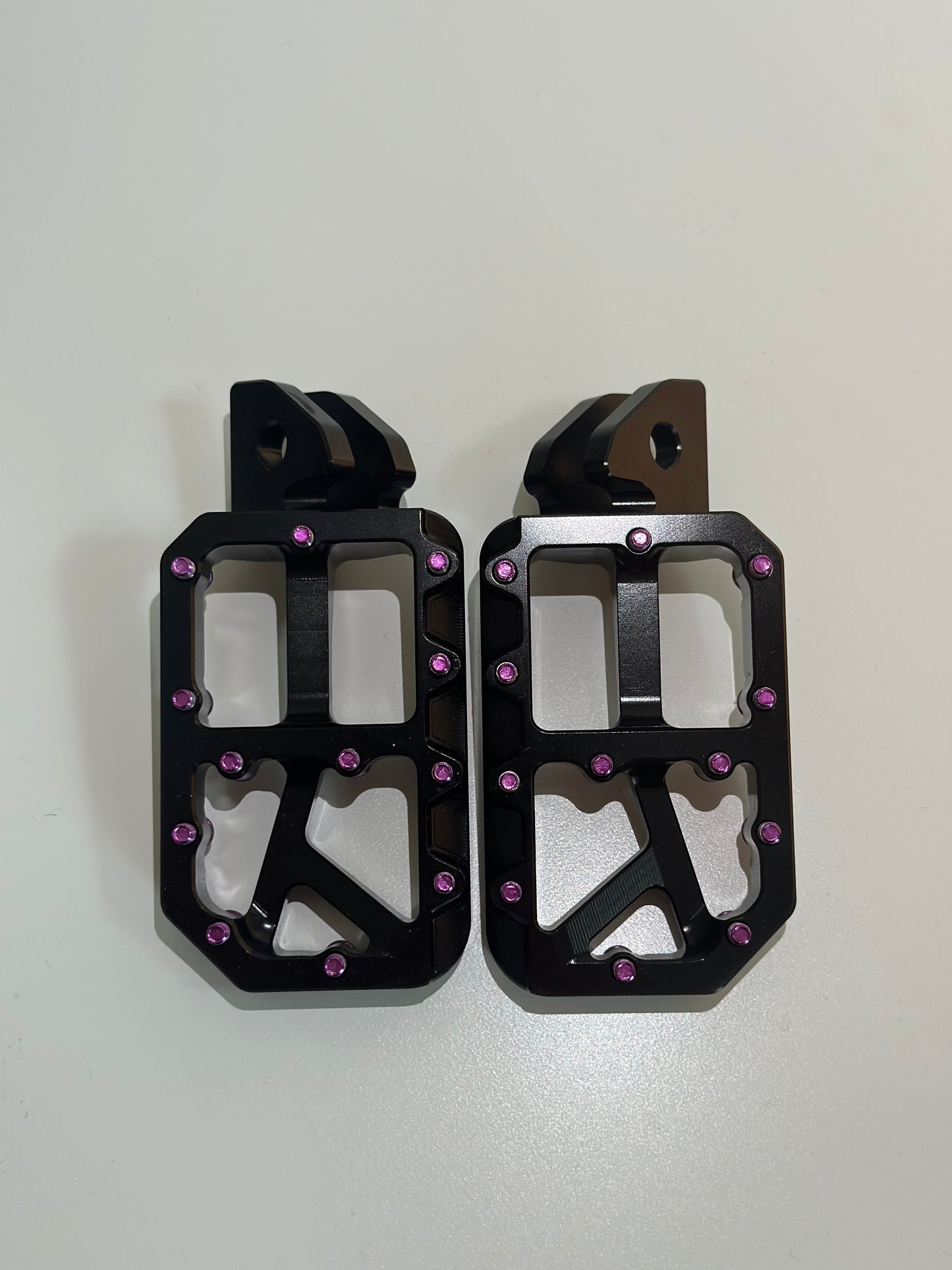 Black foot pegs