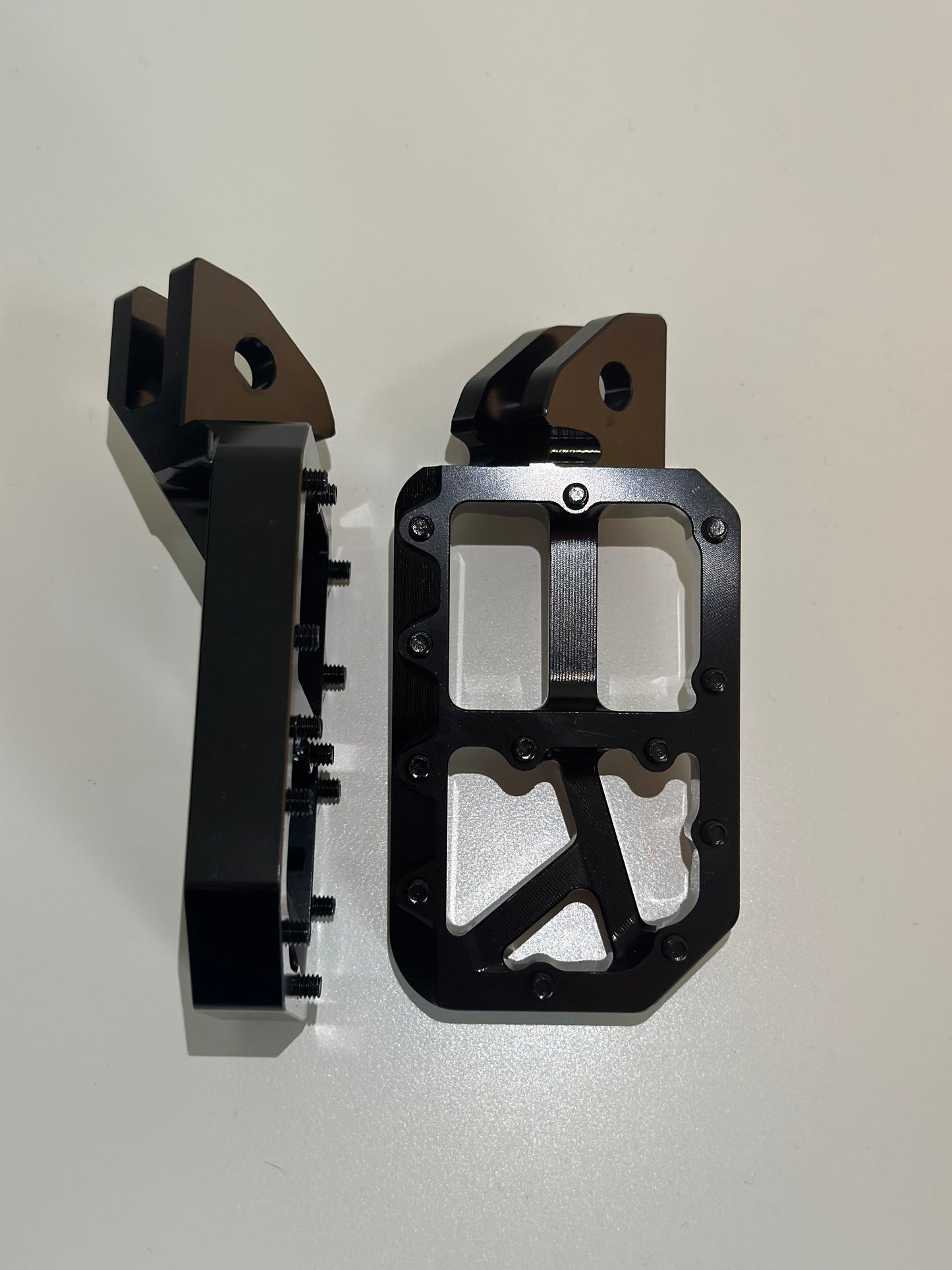 Black foot pegs