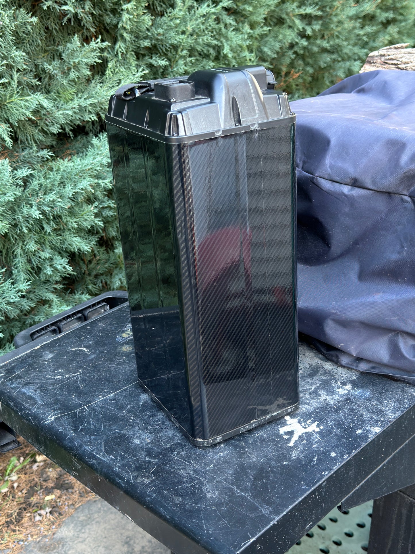 Carbon fiber battery wrap, corner far