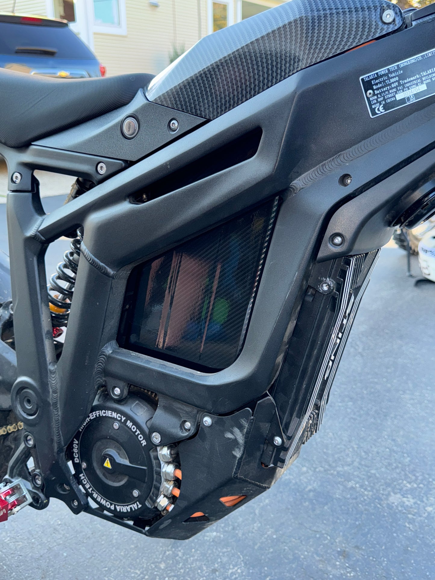 Carbon fiber battery wrap, in bike not in sunlight