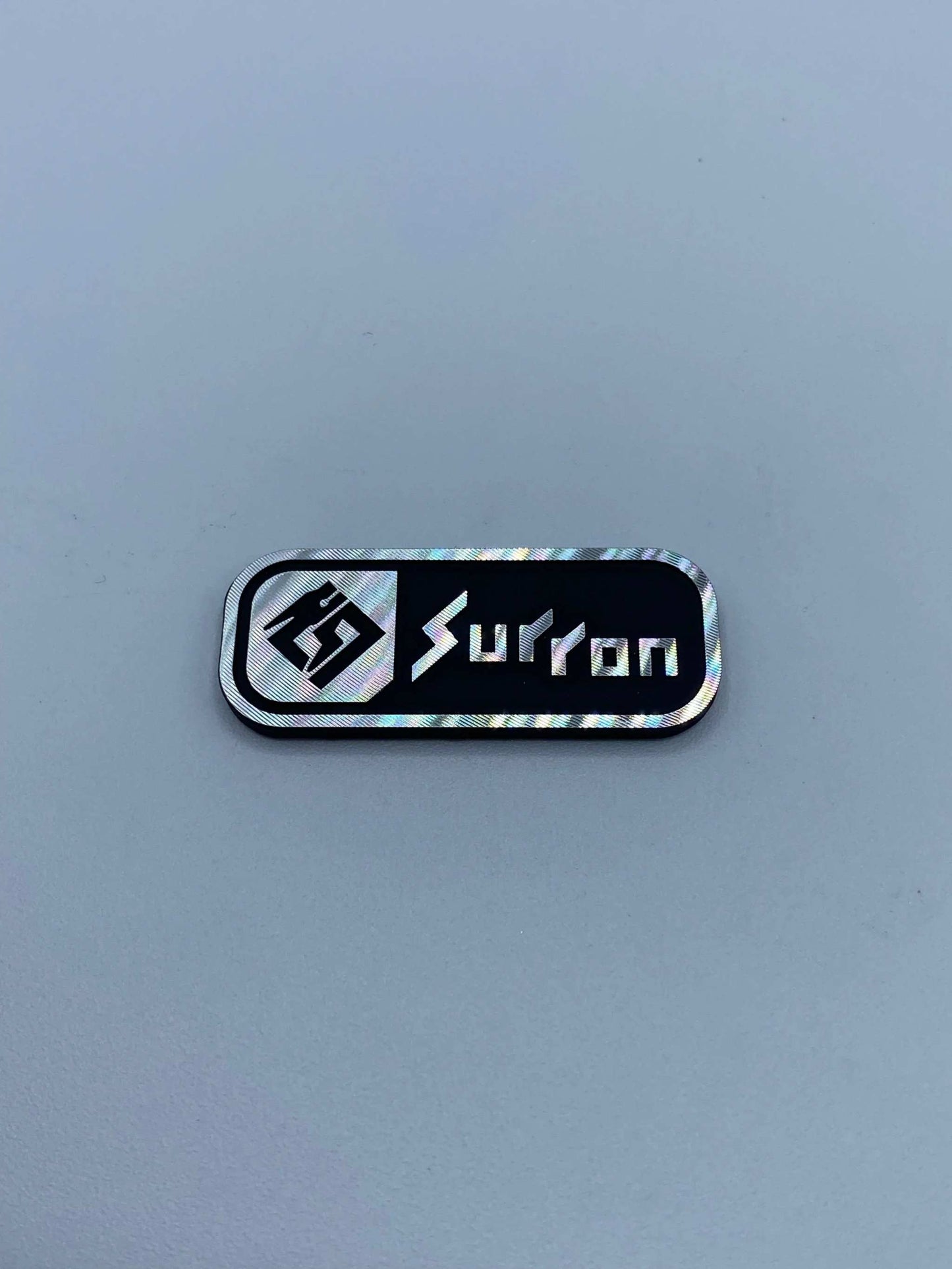 Surron Battery Lid Emblem - MXwraps