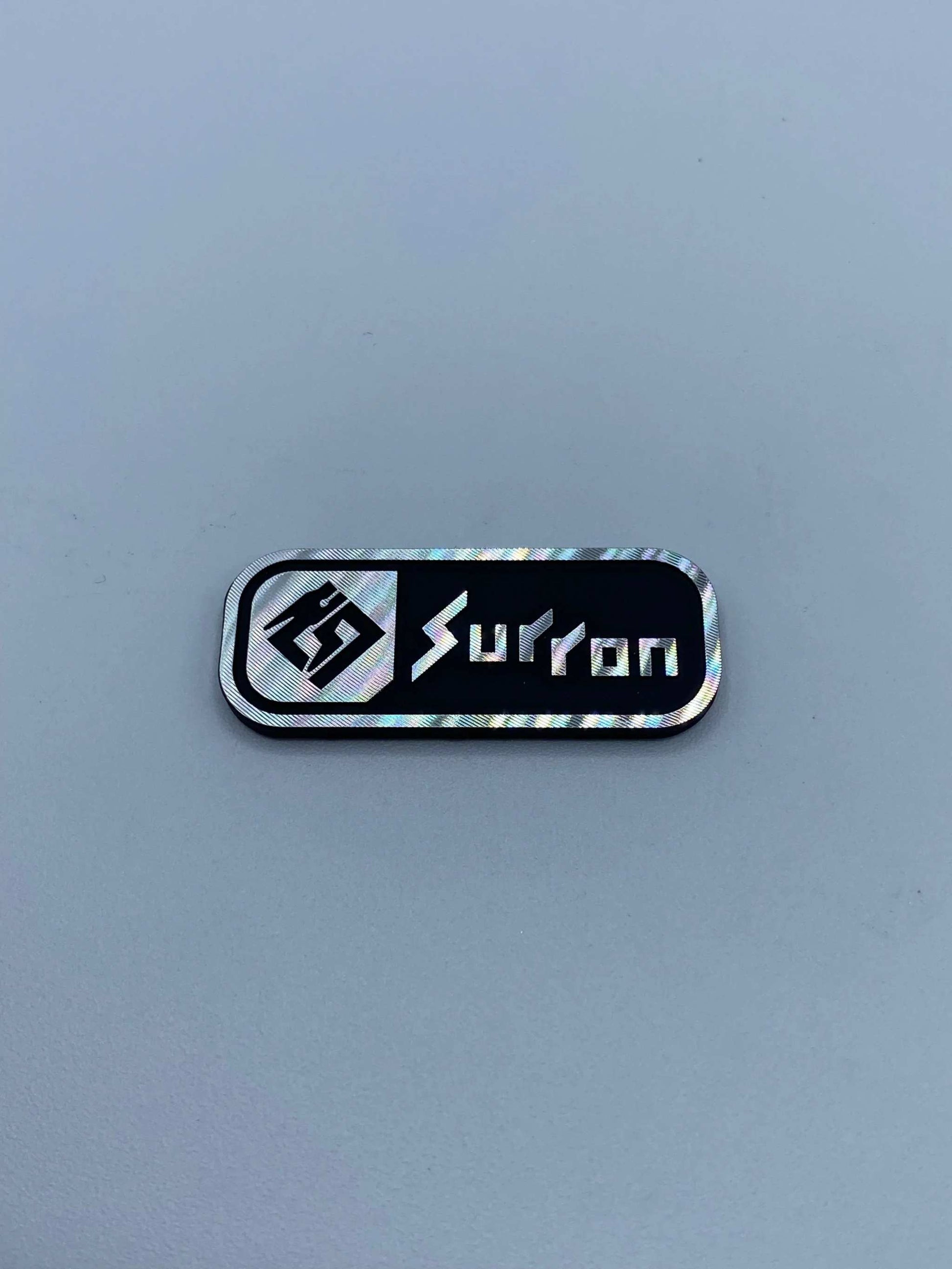 Surron Battery Lid Emblem - MXwraps