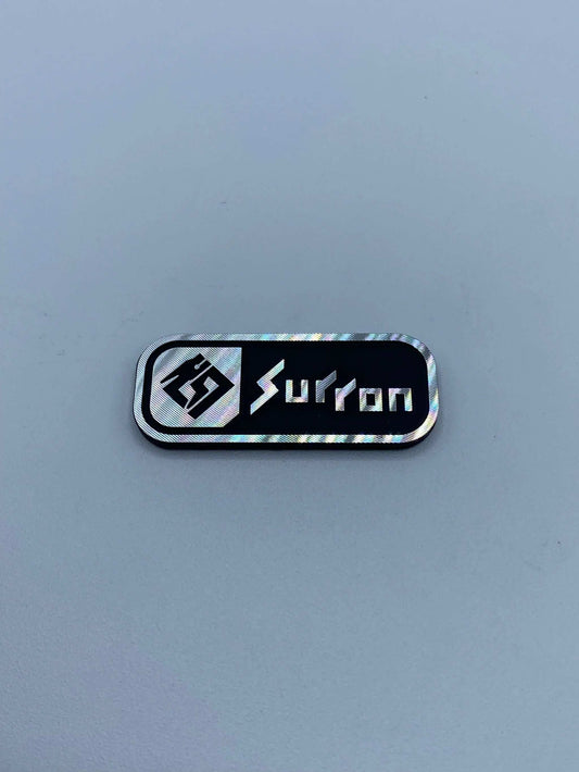 Surron Battery Lid Emblem - MXwraps