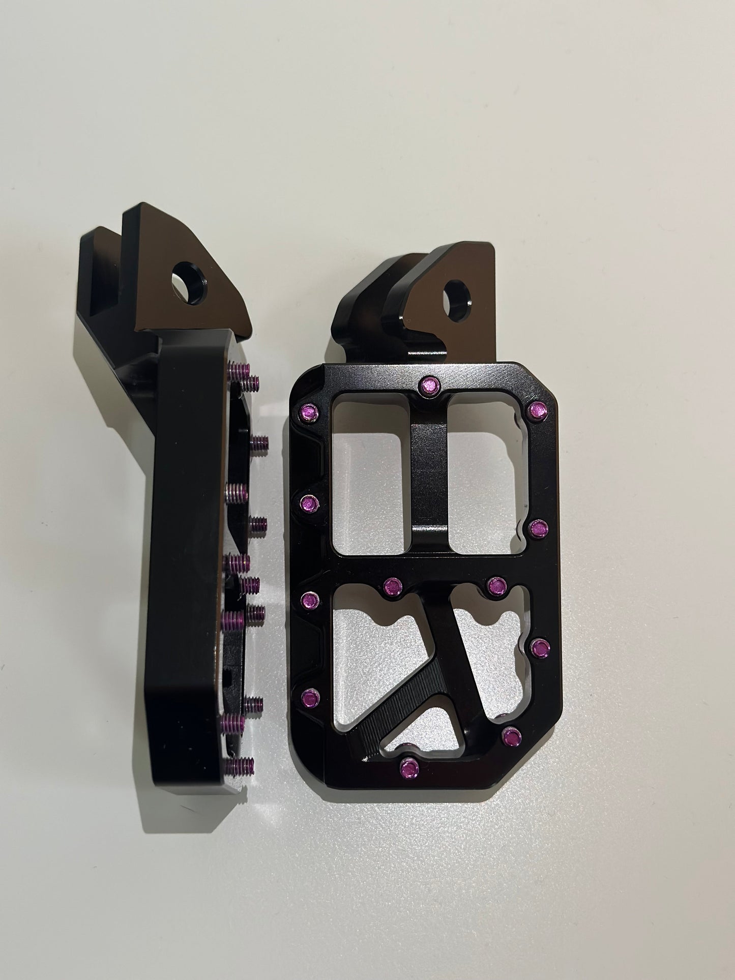 Black foot pegs