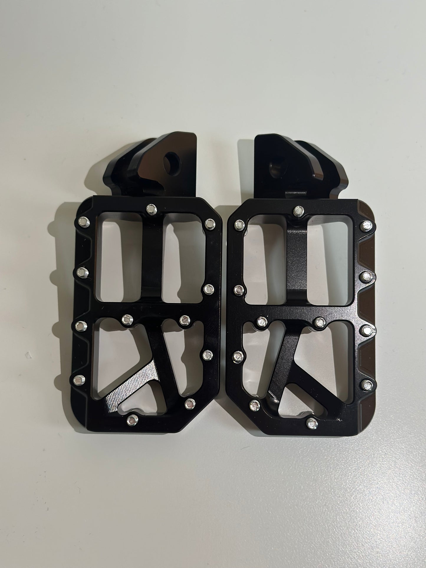 Black foot pegs