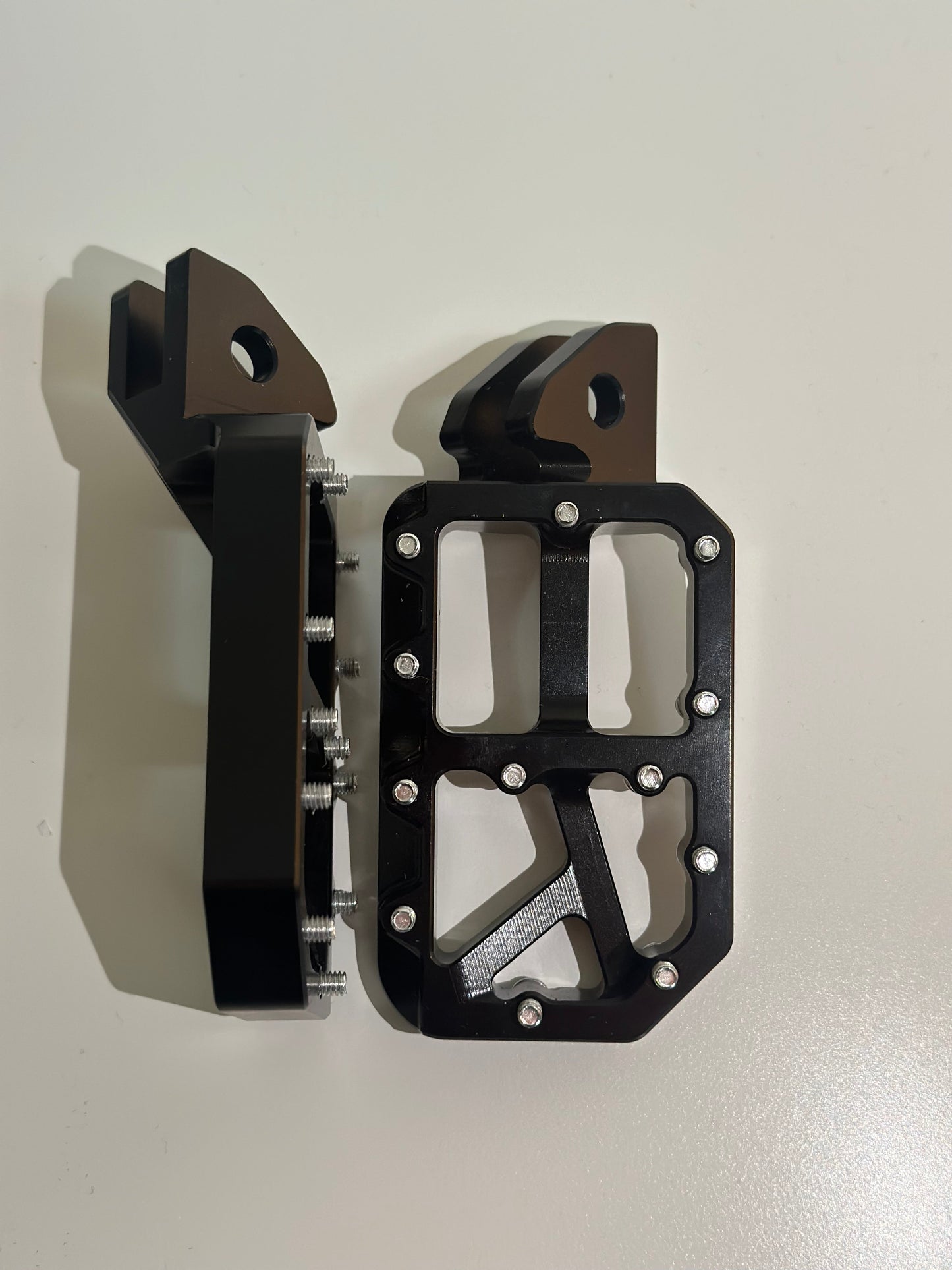 Black foot pegs