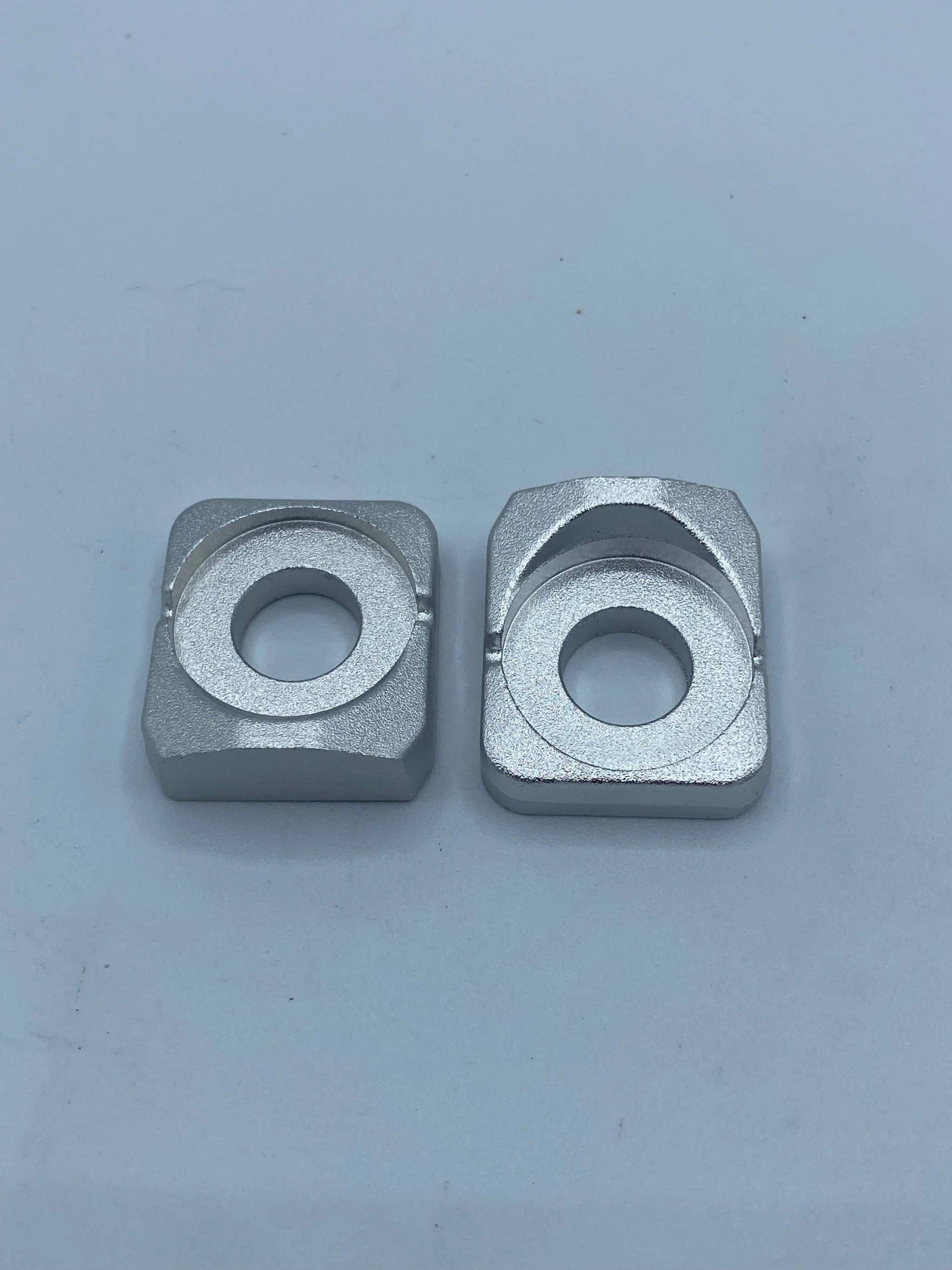 OEM Surron Light Bee Axle Blocks - MXwraps