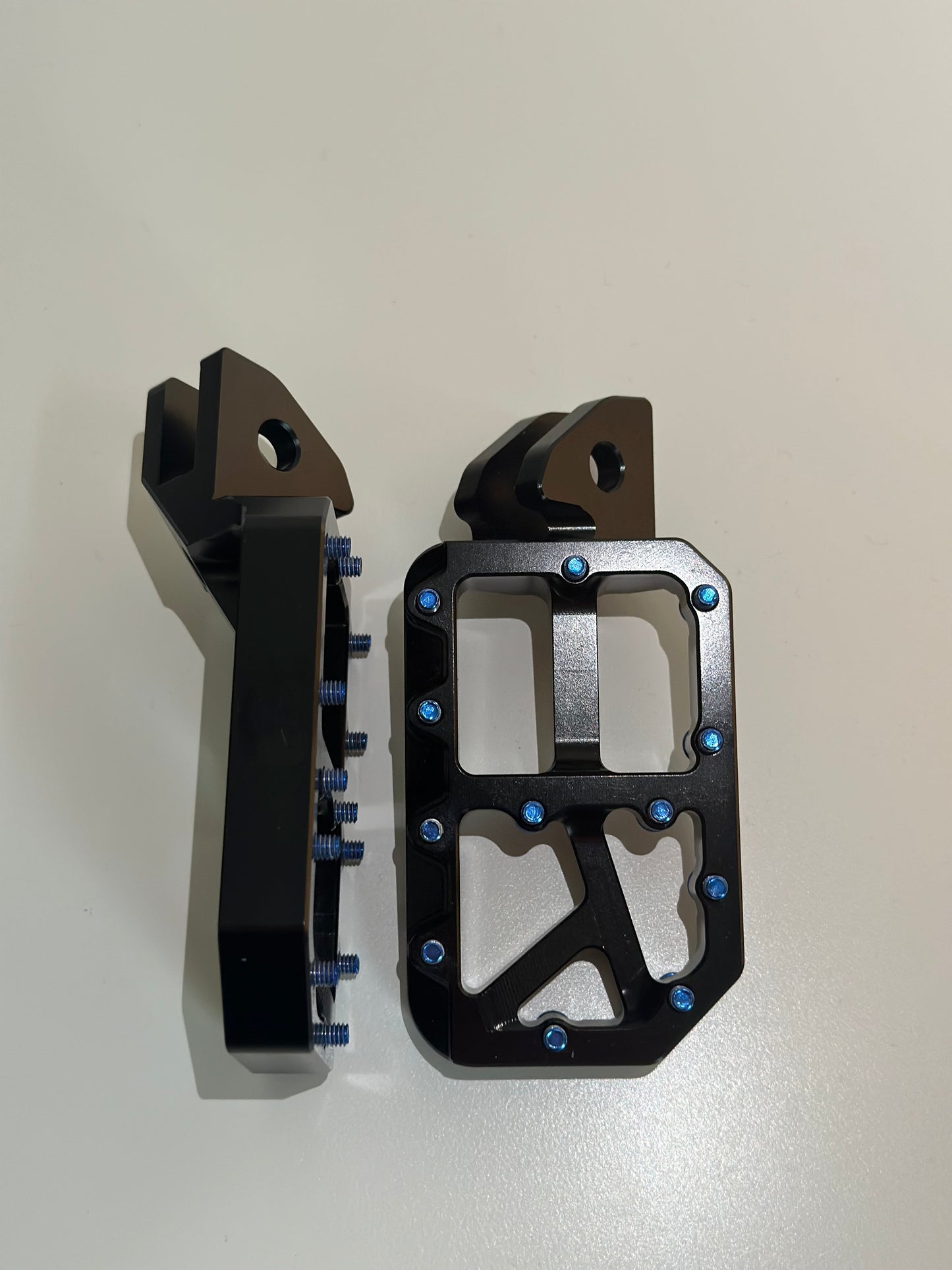 Black foot pegs