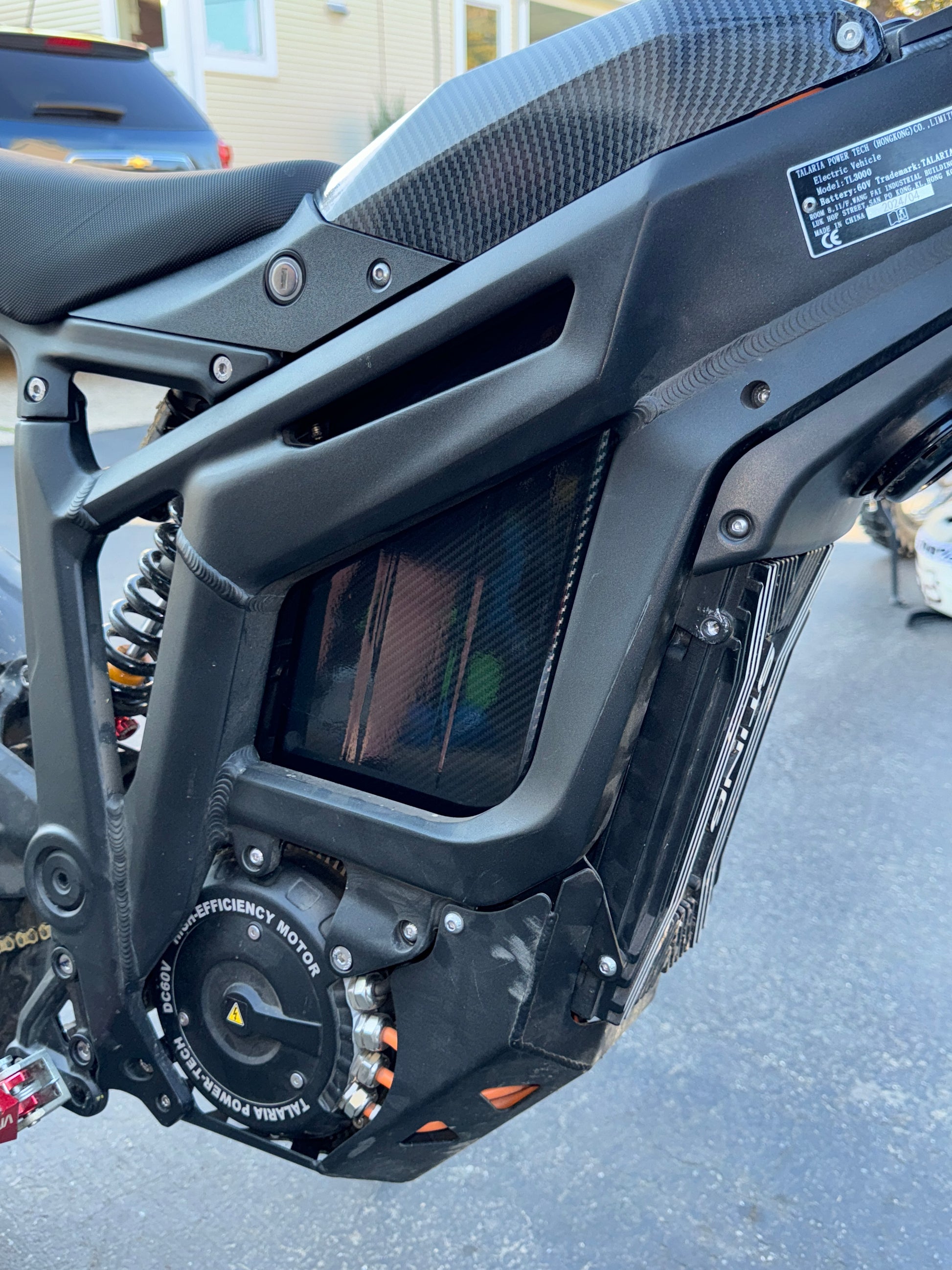 Carbon fiber battery wrap, in bike not in sunlight