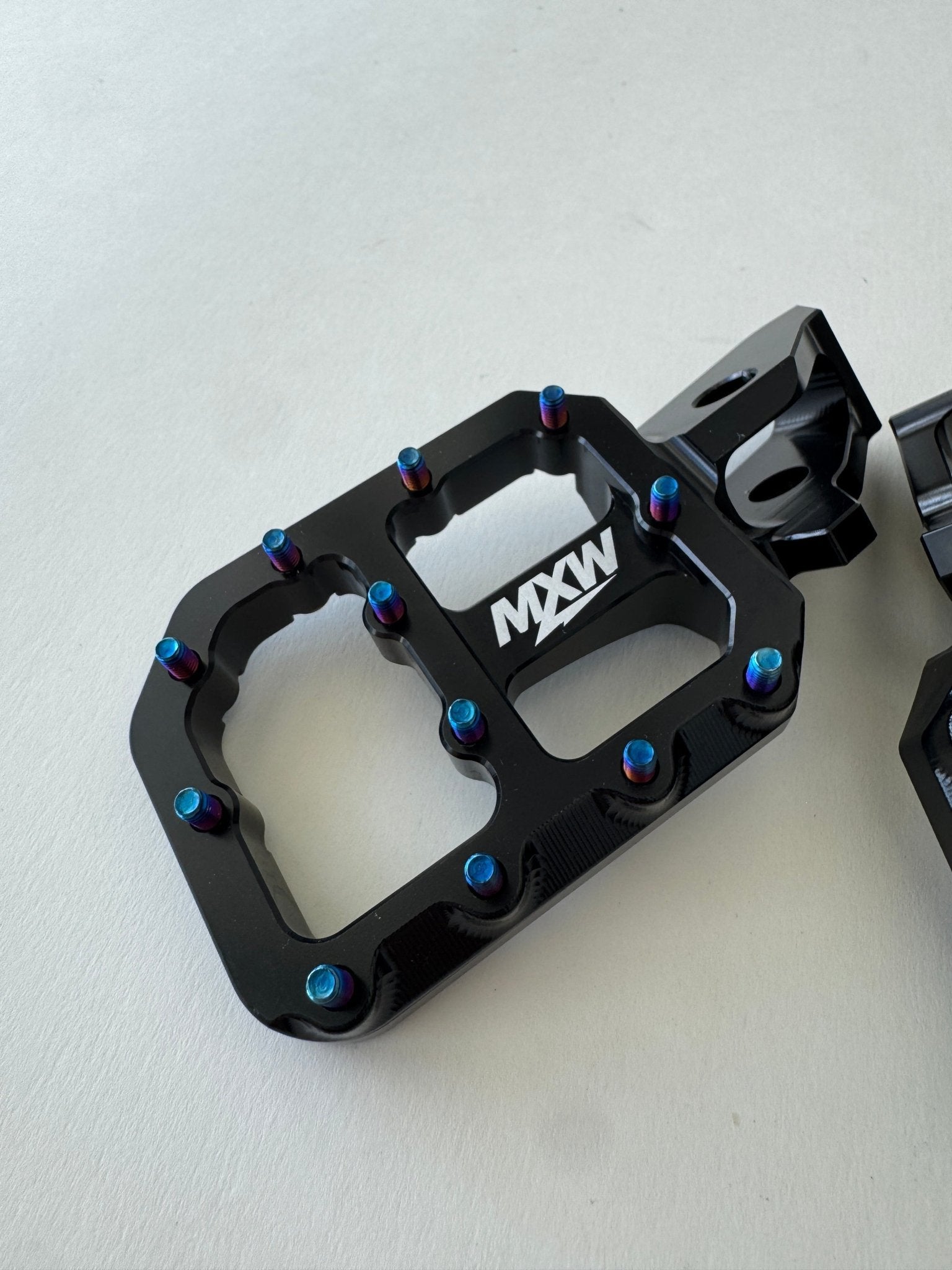 Titanium Black Wide Pegs - MXwraps