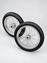 Talaria XXX MX3 MX4 chrome Supermoto wheelset — complete wheel set on a light gray studio background