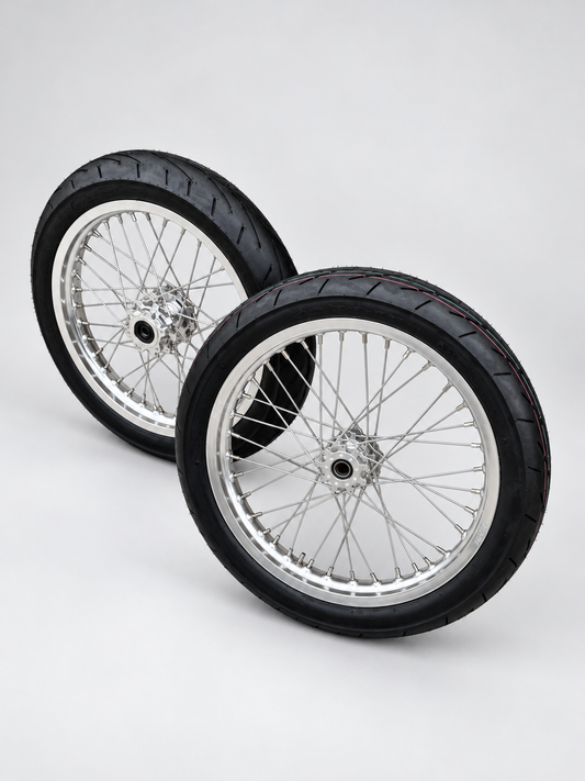 Talaria XXX MX3 MX4 chrome Supermoto wheelset — complete wheel set on a light gray studio background